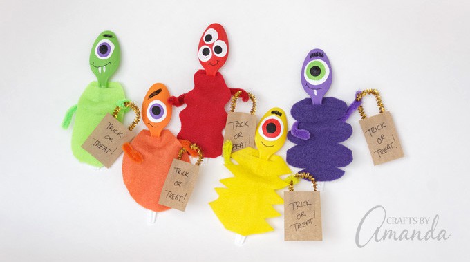colorful monsters made from plastic spoons