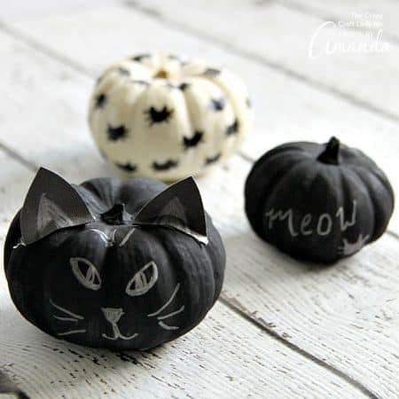 These black cat pumpkins are the perfect Halloween project for cat lovers! Learn how to make these easy no carve chalkboard painted pumpkins.