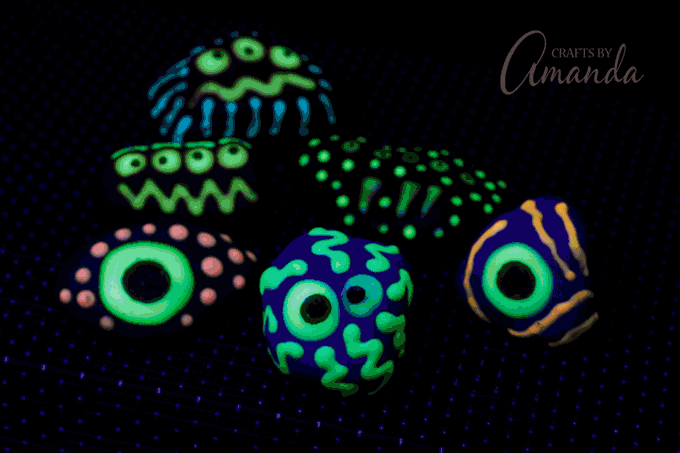 I used Tulip Glow in the Dark dimensional fabric paint over acrylic paint on my monster rocks.
