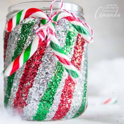 Mason Jar Luminary: candy cane inspired glittery mason jars!