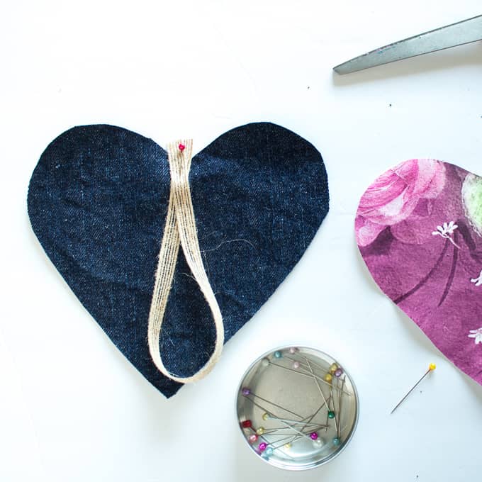 ribbon pinned to center of fabric heart