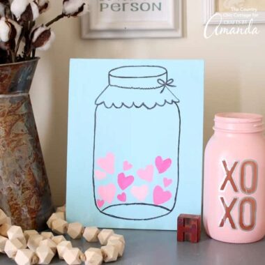Make this Mason Jar Valentine's Day art in minutes with our free printable template.  Add it to your home decor for a touch of love during the blah winter months.