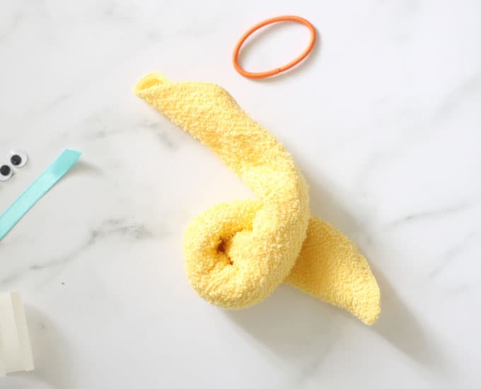 twisted yellow washcloth