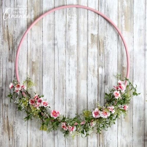 This cherry blossom hula hoop wreath will make a cheery addition to your spring décor. Hang it above your mantel or on your wall for a pop of spring color.