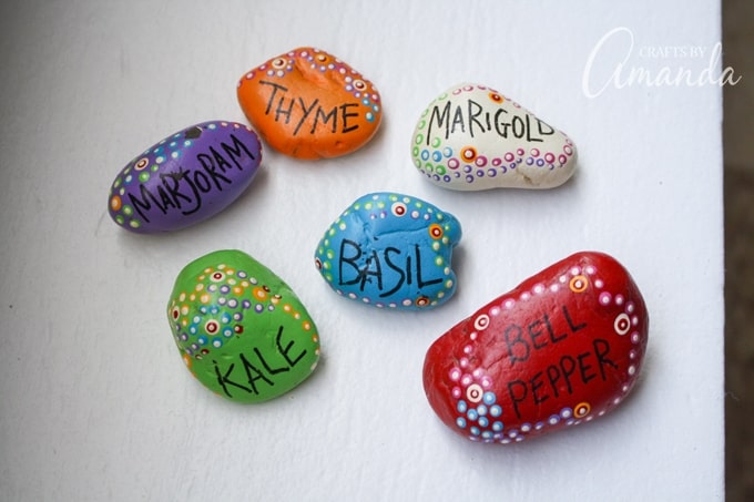 Painted Rock Garden Markers- 2 years after painting!