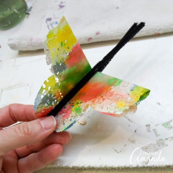 Paper Doily Butterflies a fun butterfly craft perfect for spring!