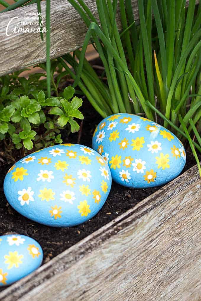 Daisy Painted Rocks a fun rock painting idea Crafts by Amanda