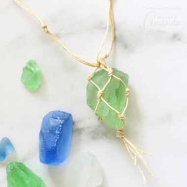 This macrame sea glass necklace lets you wear your beach discoveries this summer. All you need is a beautiful piece of sea glass and some cording to make your own jewelry for this project.