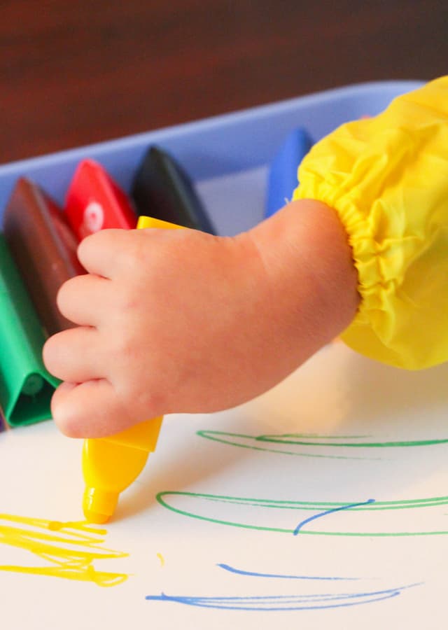 toddler using marker