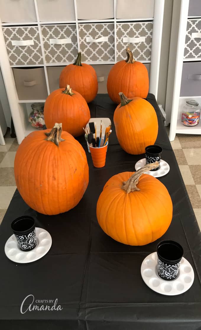 Painting Two-Dollar Pumpkins on a Wednesday Night