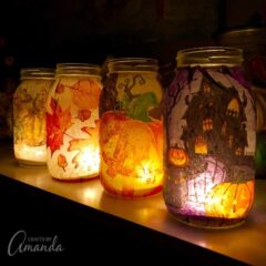 beautiful fall and halloween mason jar luminaries made from paper napkins and mod podge