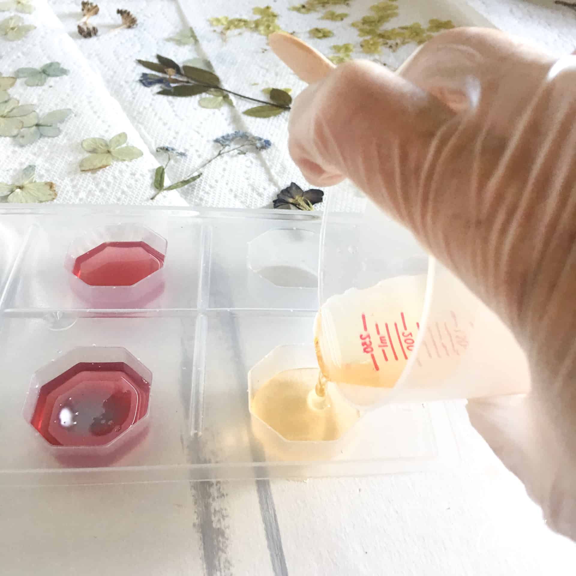 pouring resin into molds