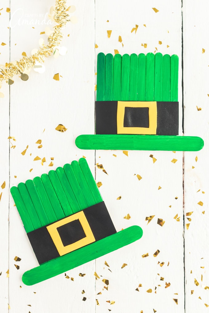 two craft stick leprechaun hats