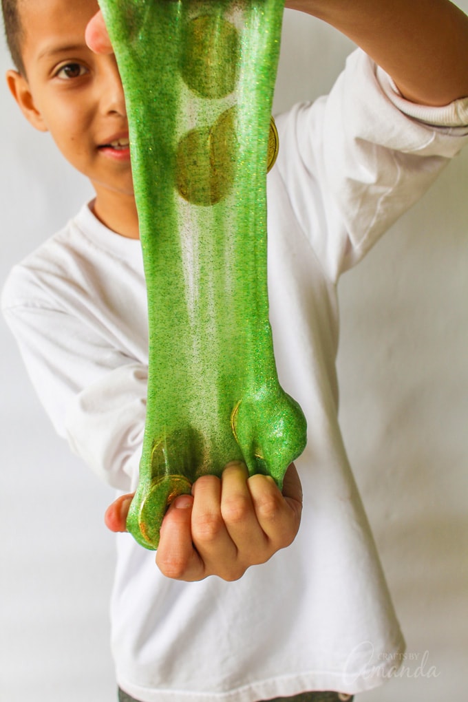 boy stretching out green slime