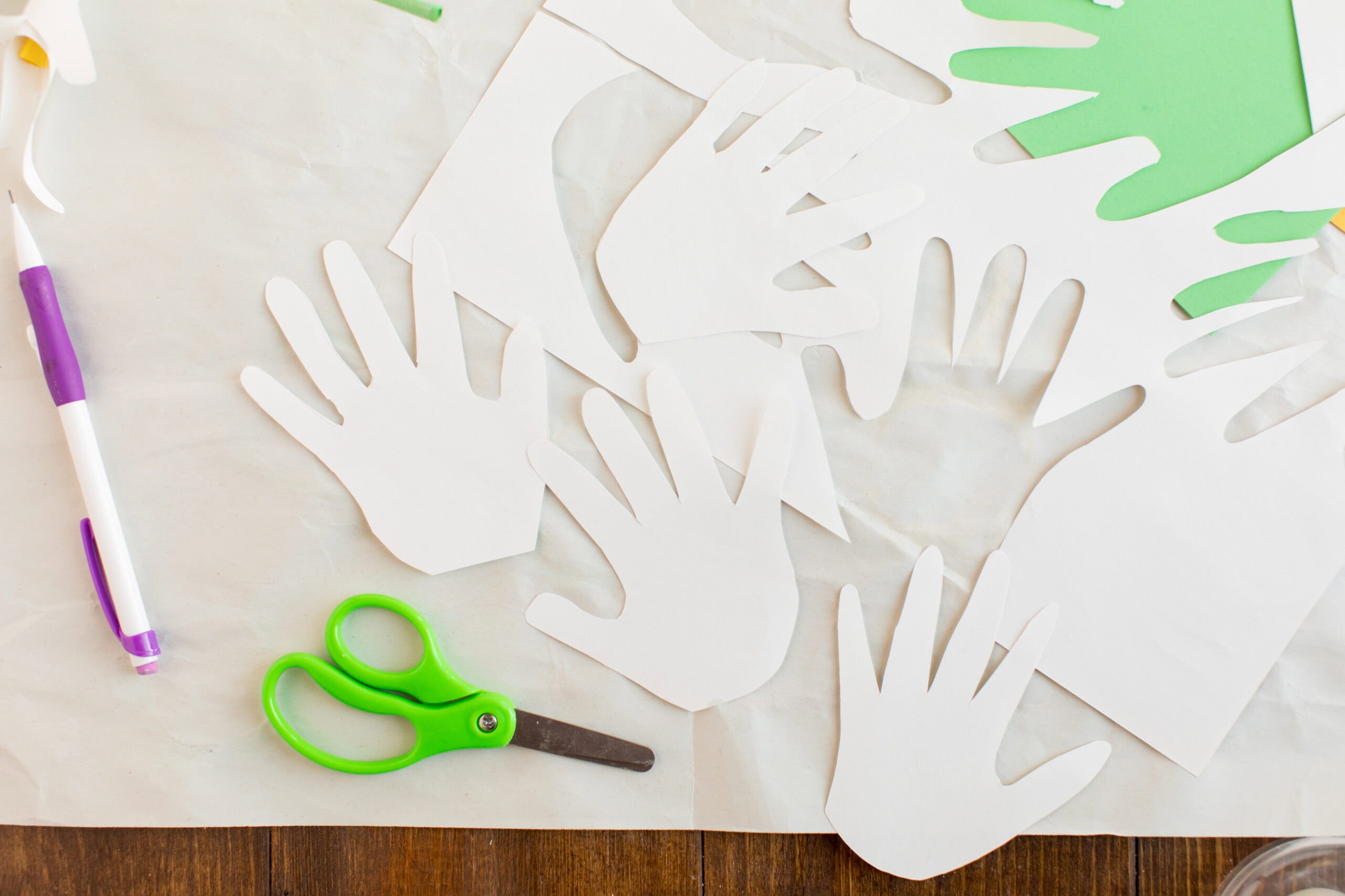 handprints cut out of construction paper