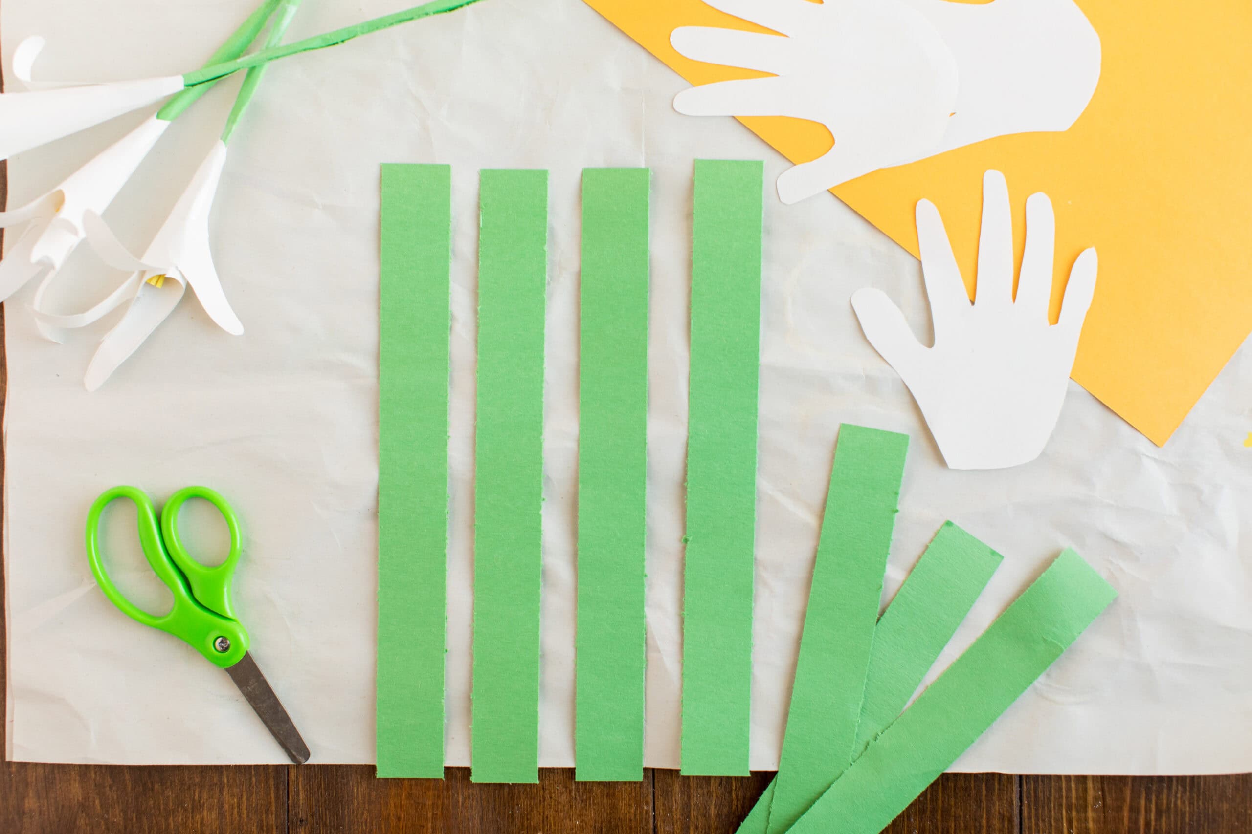 green strips of construction paper