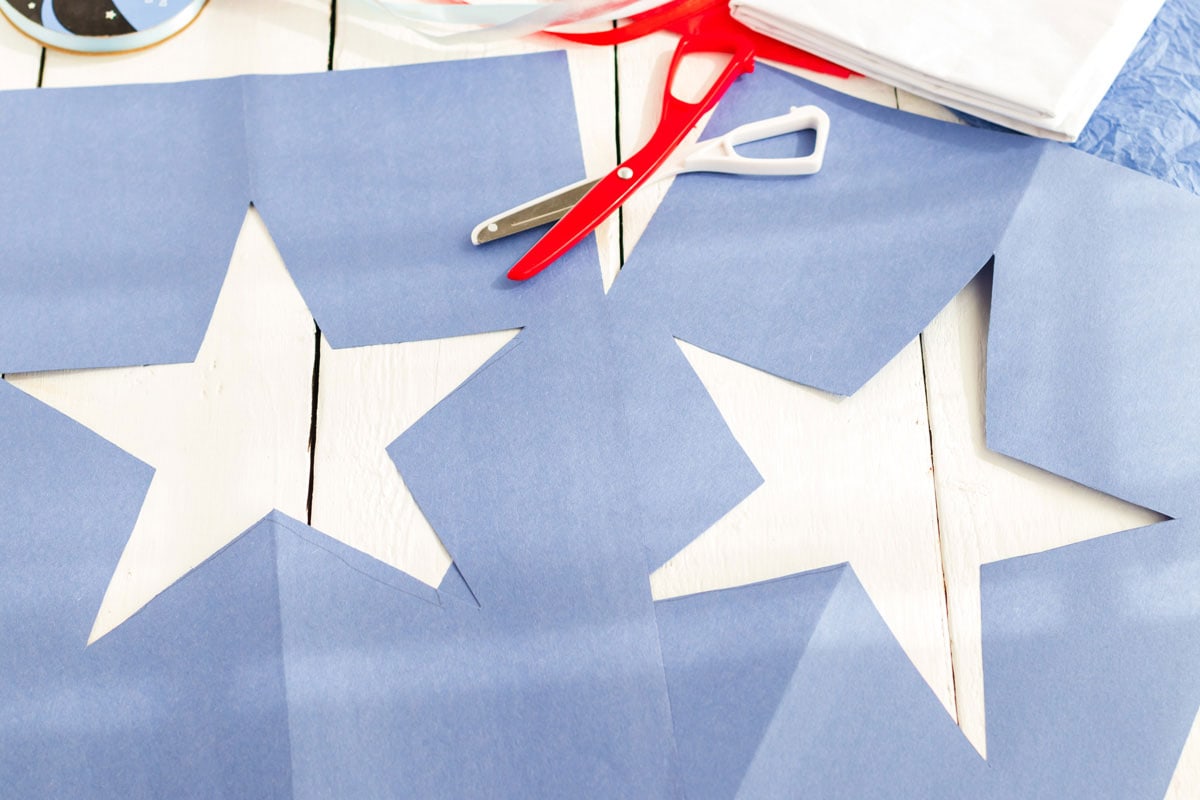 two stars cut from blue construction paper