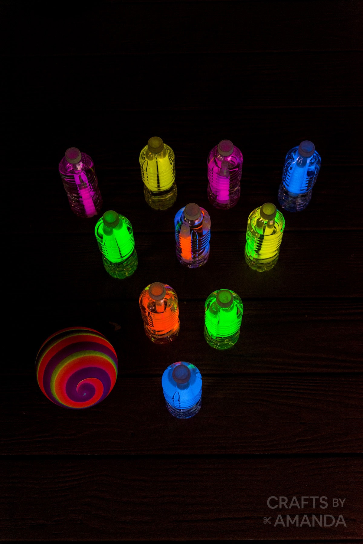 DIY glow in the dark bowling with water bottles.