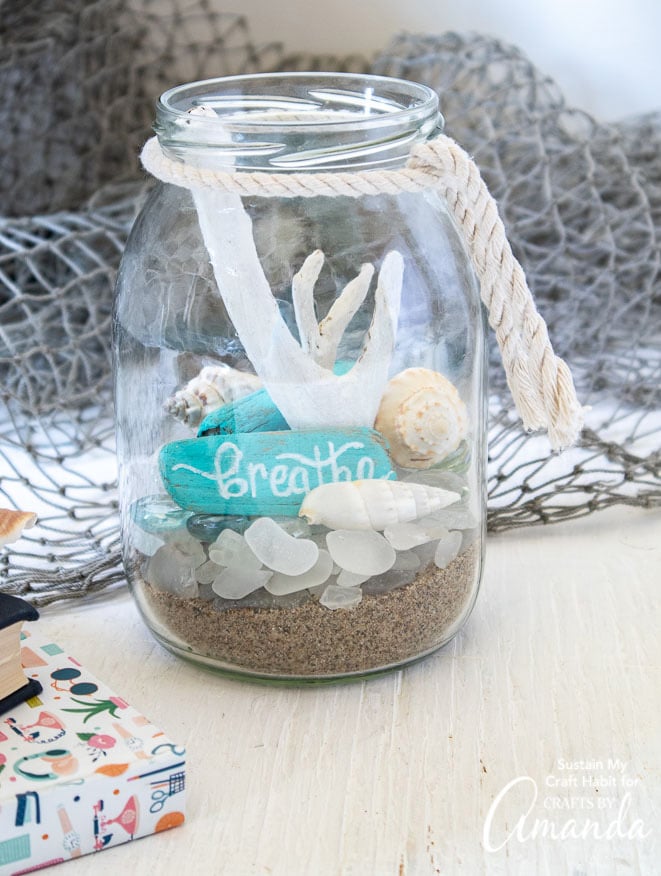 jar filled with beach items