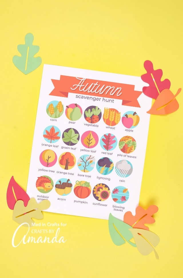 fall scavenger hunt with felt leaves on yellow backdrop