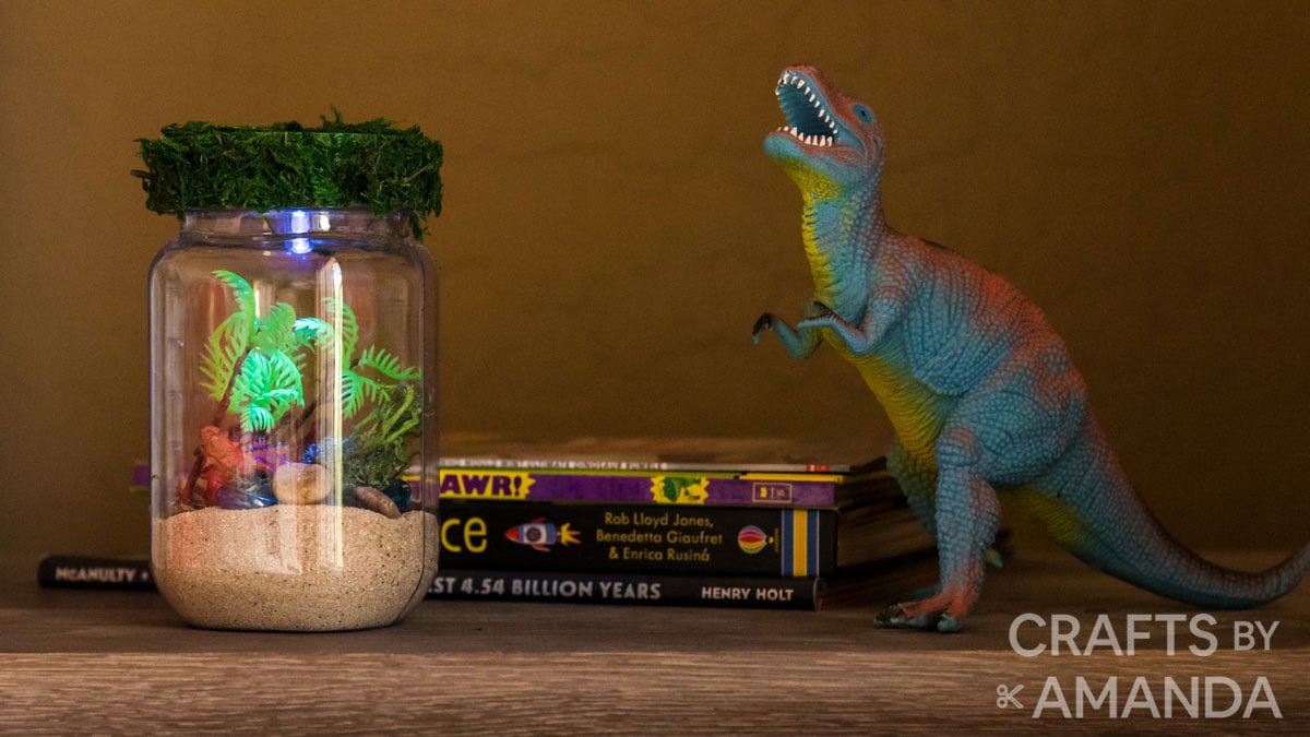 dinosaur toy on a night stand