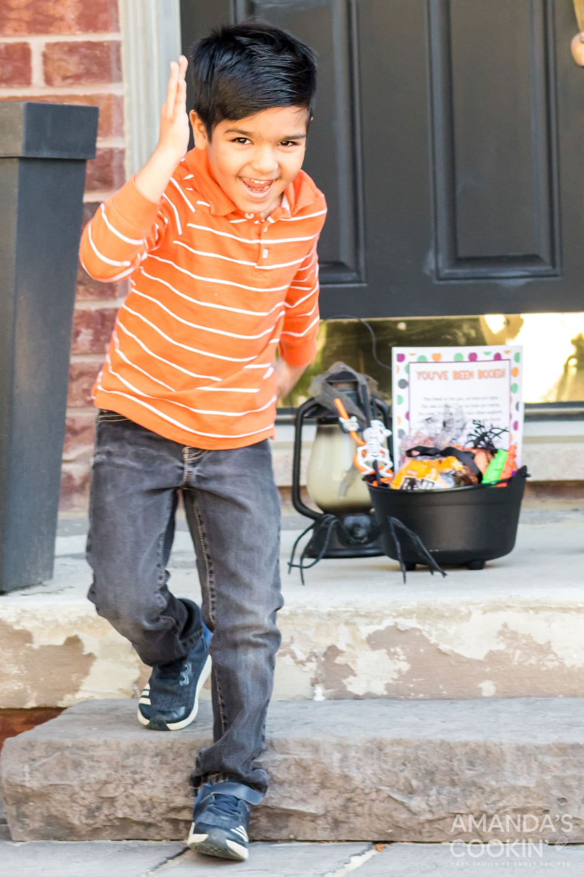 boy running from porch