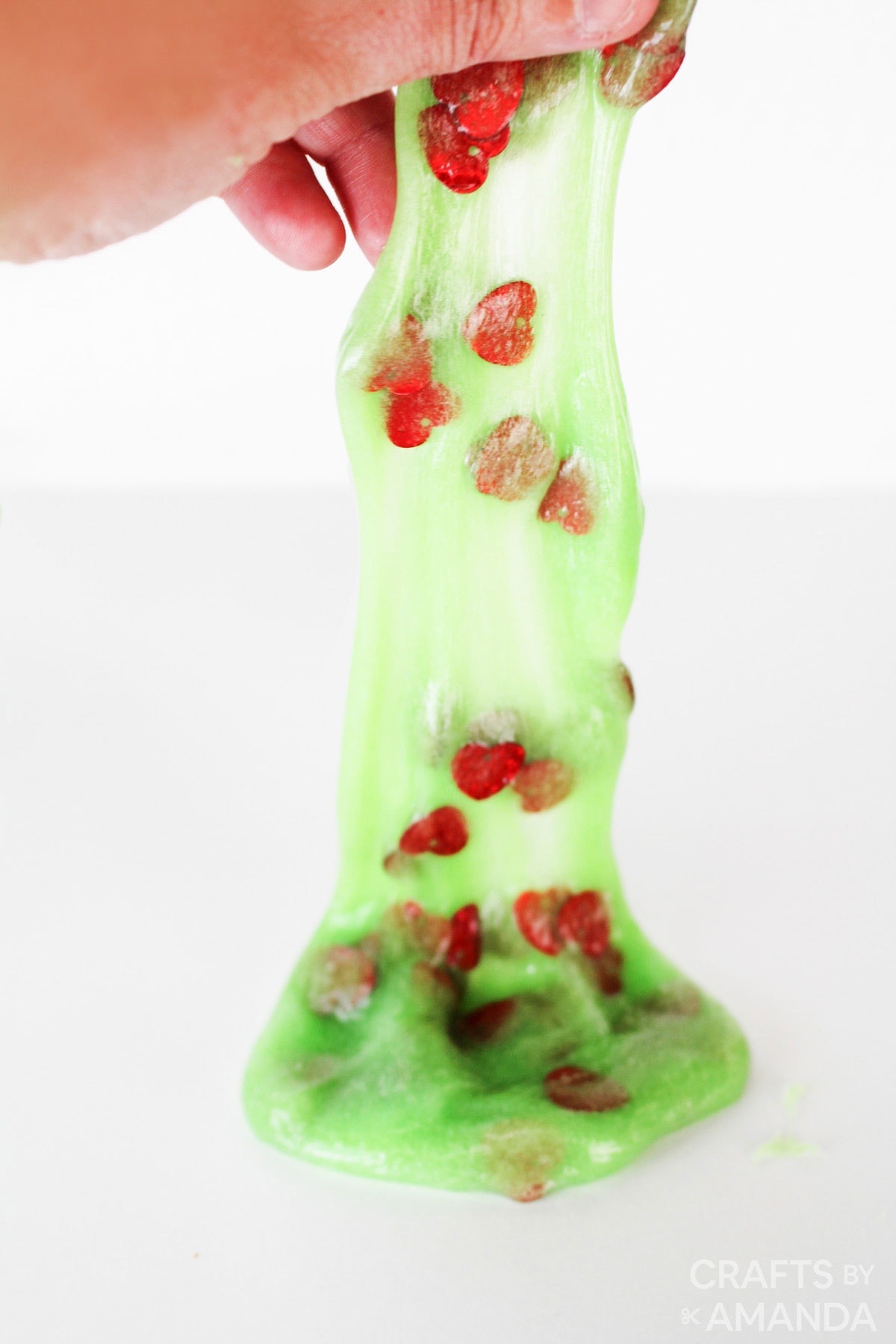 grinch slime with red hearts