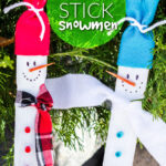 paint stick snowman pinterest image with text
