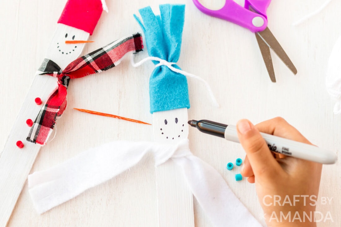 Paint Stick Snowmen Crafts by Amanda Winter Crafts