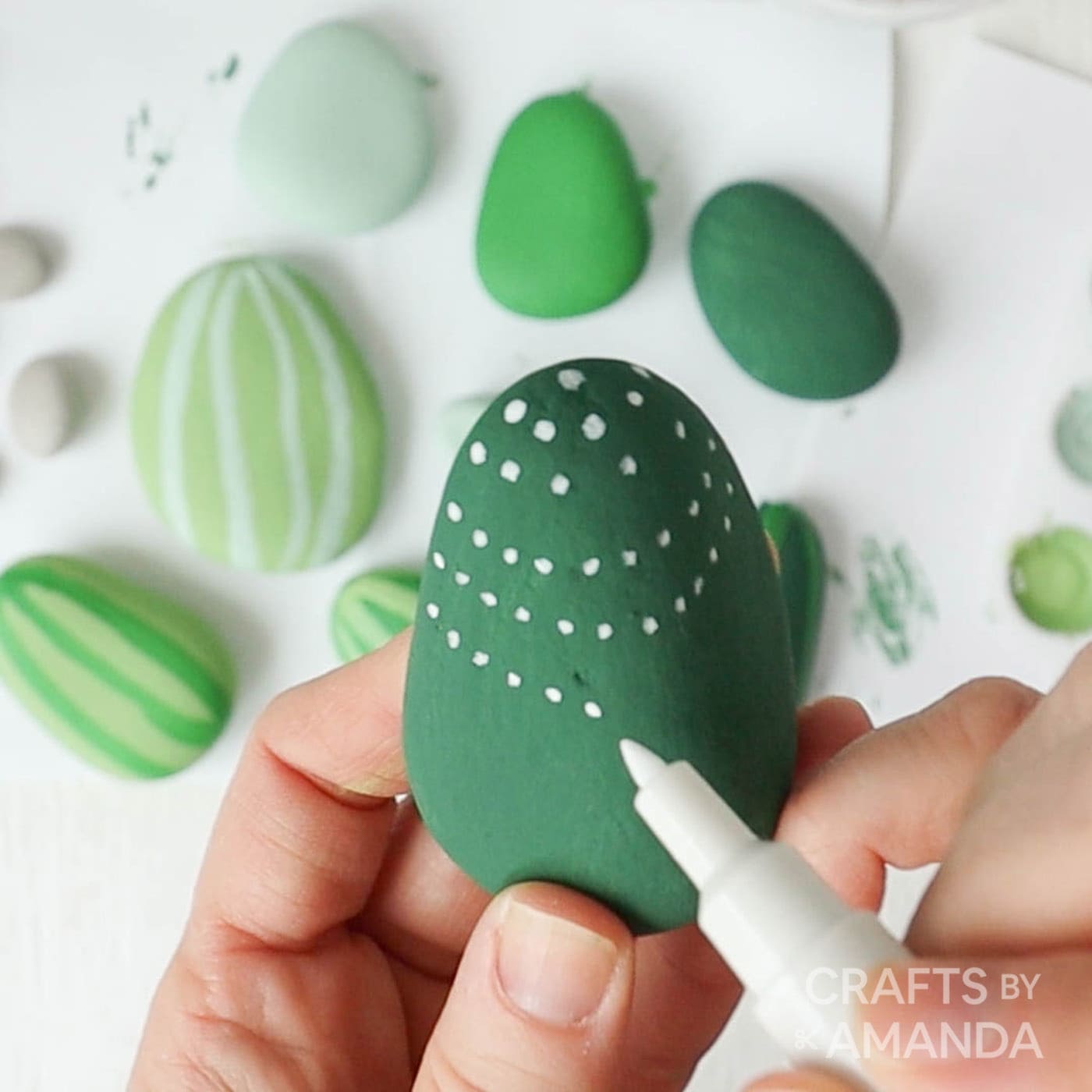 adding white spots to a green rock