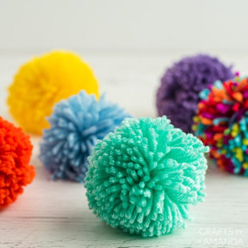 colorful yarn pom poms