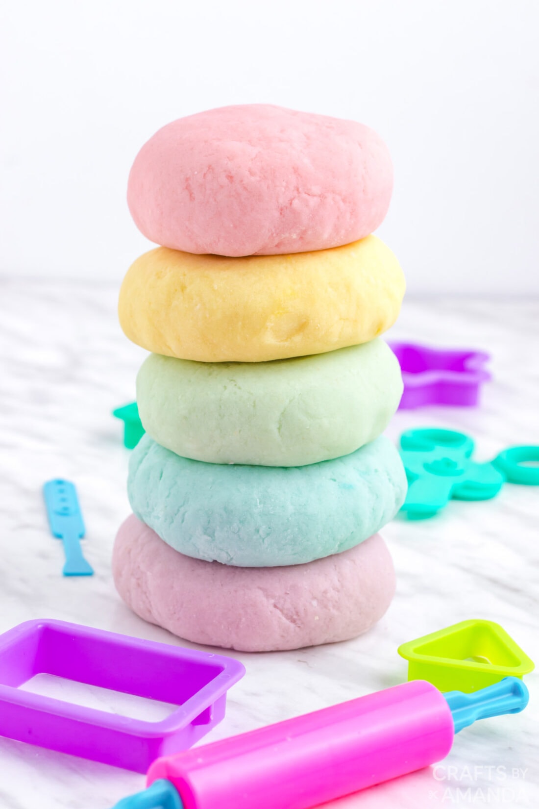stack of pastel colored play dough