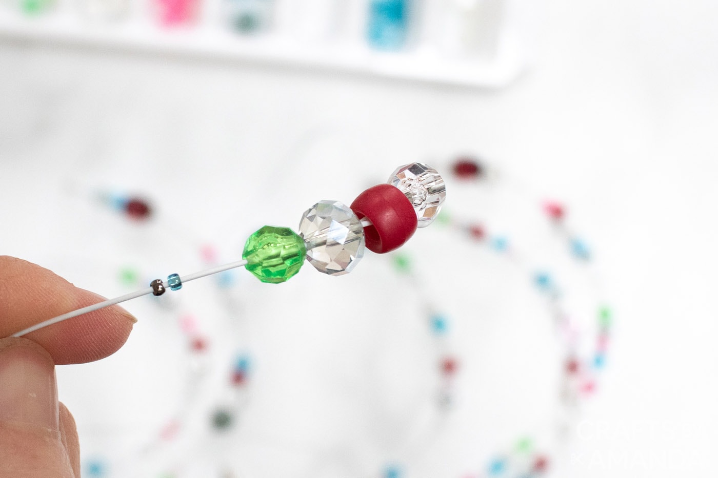colorful beads added to a wire
