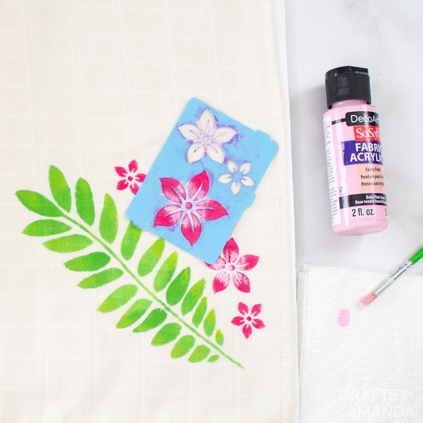 baby pink paint stenciled on center of flower