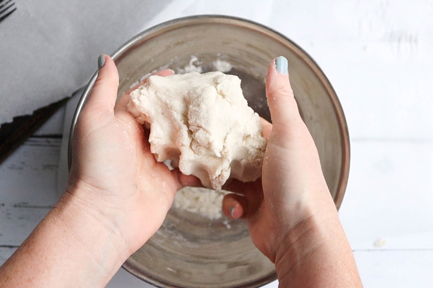 hands holding salt dough