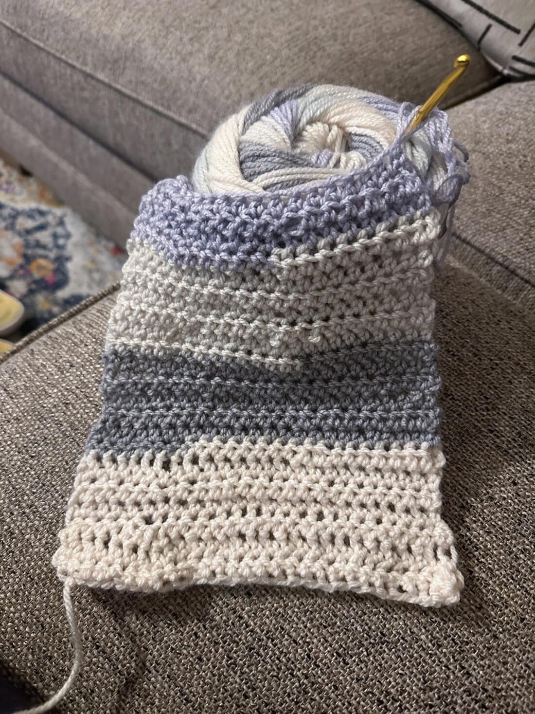 partially completed crochet scarf