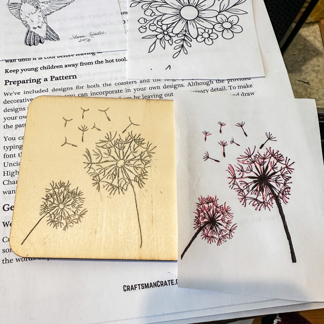 showing the design transferred to the wooden square