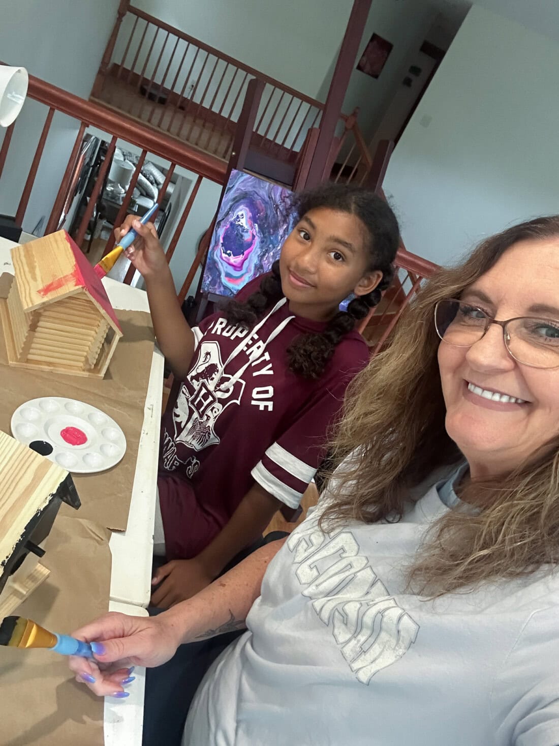 woman and girl at craft table